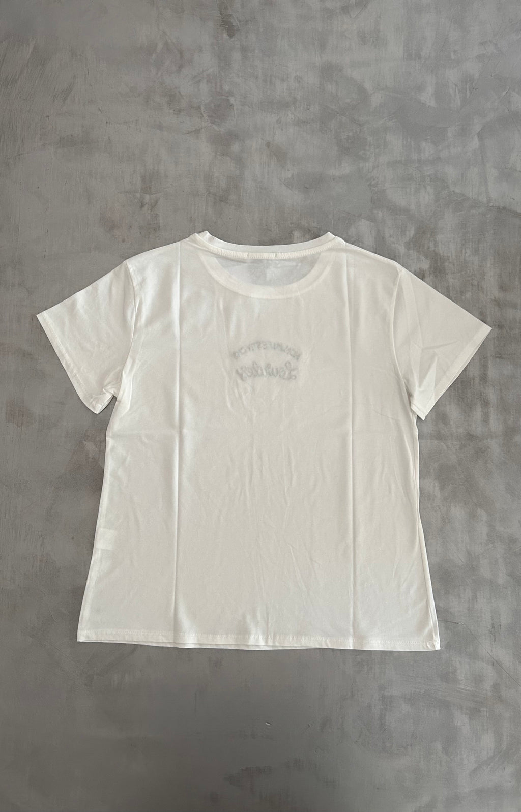 T-shirt ricamata Namastè