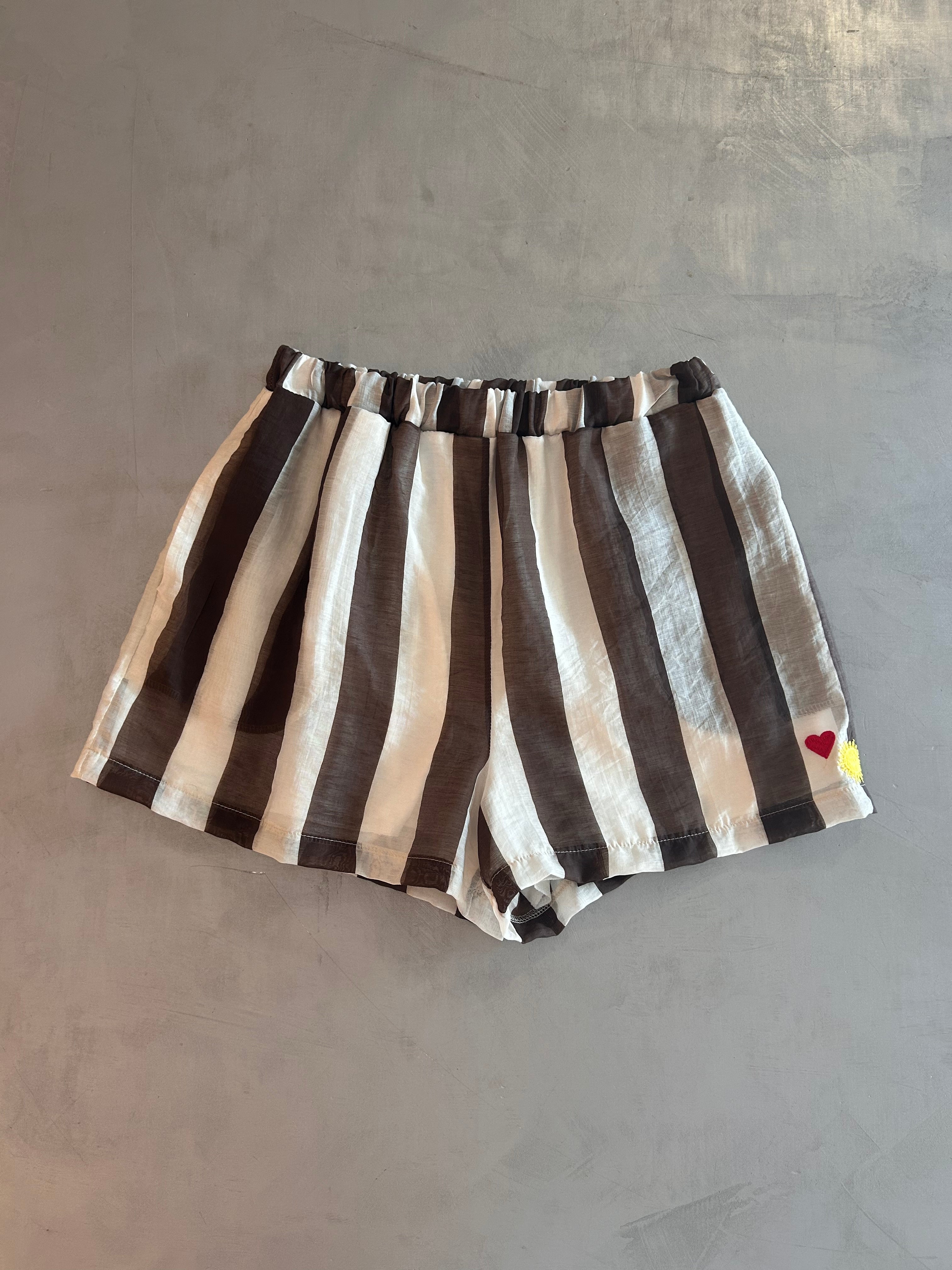 Shorts con ricamo Tensione In